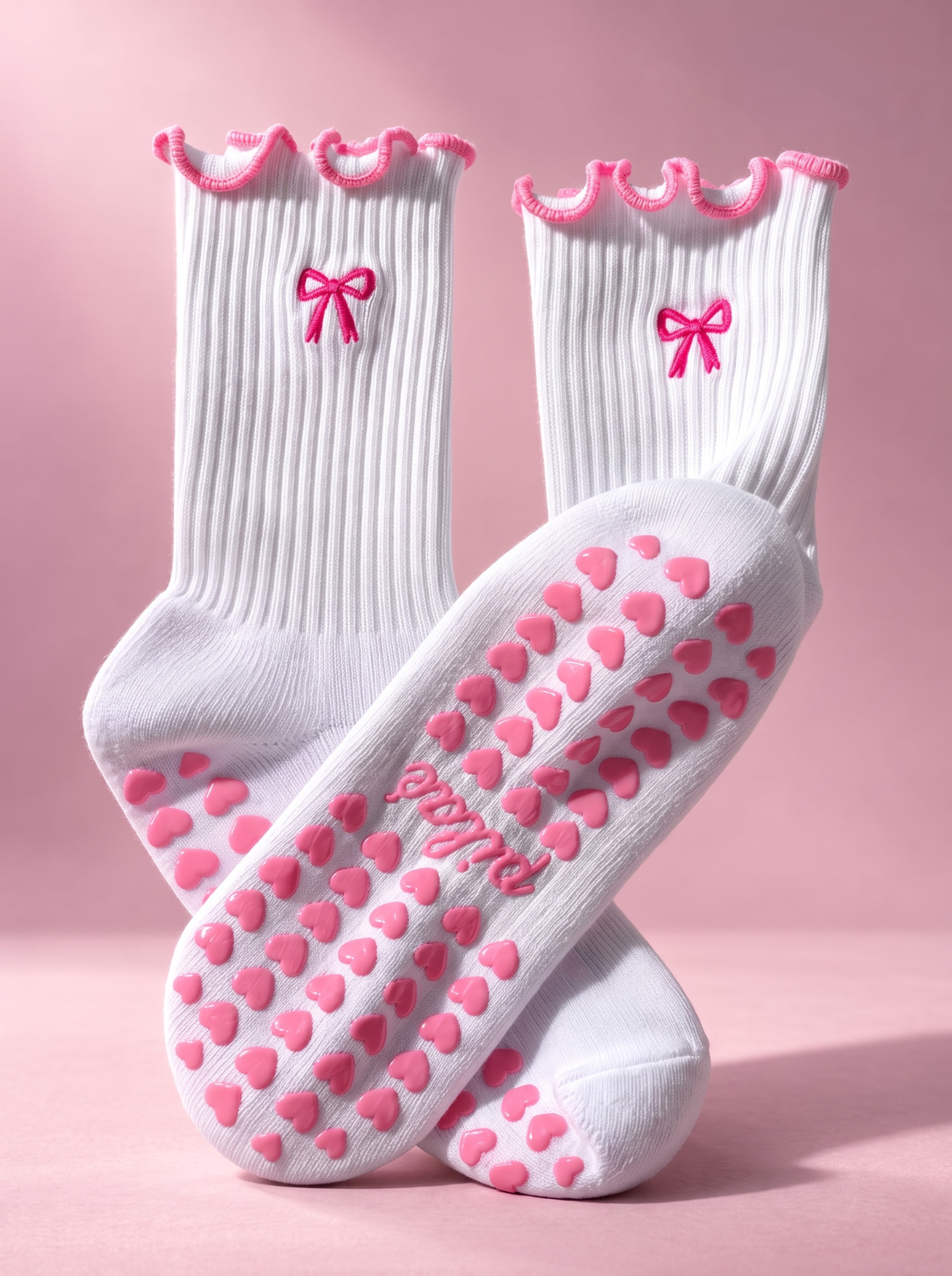 Semelle des chaussettes Pilaé Rose Bonbon avec picots en cœur et signature pilaé